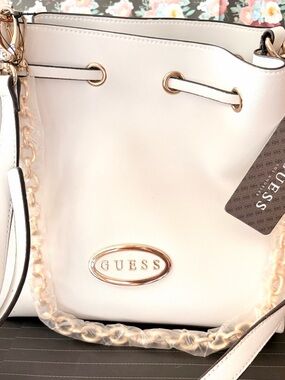 GUESS Cream Drawstring Bucket Bag with Gold Hardware